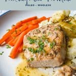 pinterest image of a pork chop with mashed potatoes and carrots on a plate with low fodmap instant pot pork chops one pot meal paleo whole30 at the top and goodnomshoney.com at the bottom.