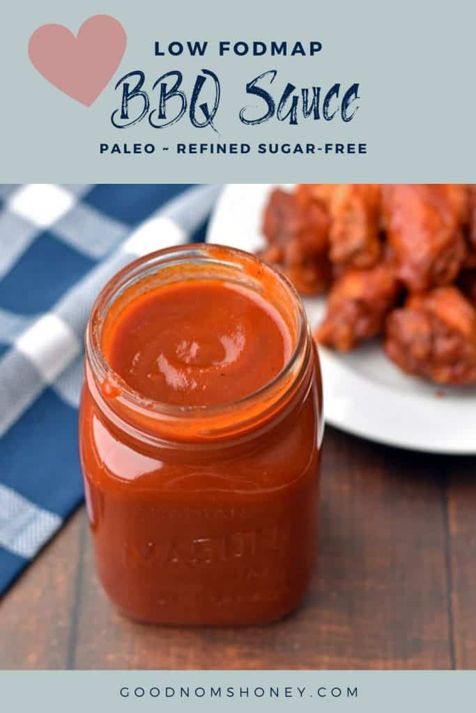 a jar of low fodmap BBQ sauce in front of a plate of chicken wings with the words low fodmap BBQ sauce paleo refined sugar-free at the top and goodnomshoney.com at the bottom