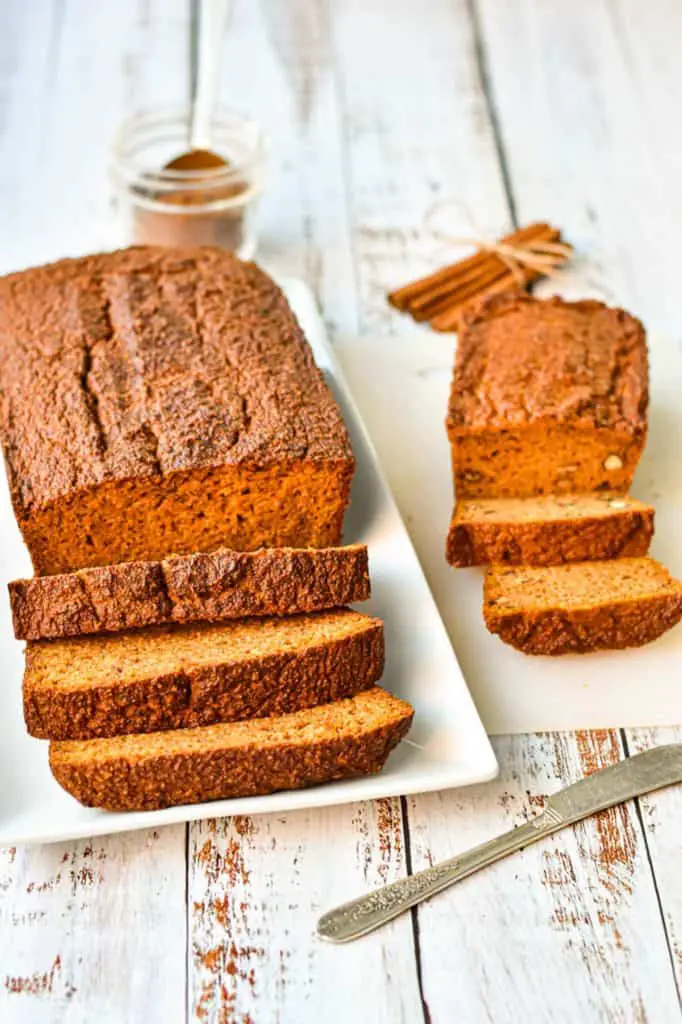 a large and small loaf of sliced low fodmap pumpkin bread