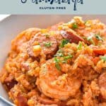 Pinterest image of a bowl of jambalaya with low fodmap instant pot jambalaya gluten-free at the top and goodnomshoney.com at the bottom.